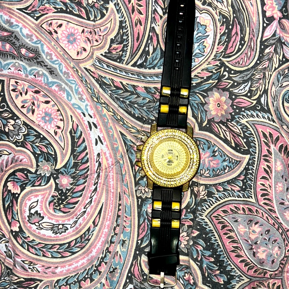 It’s a gold watch with diamond on it